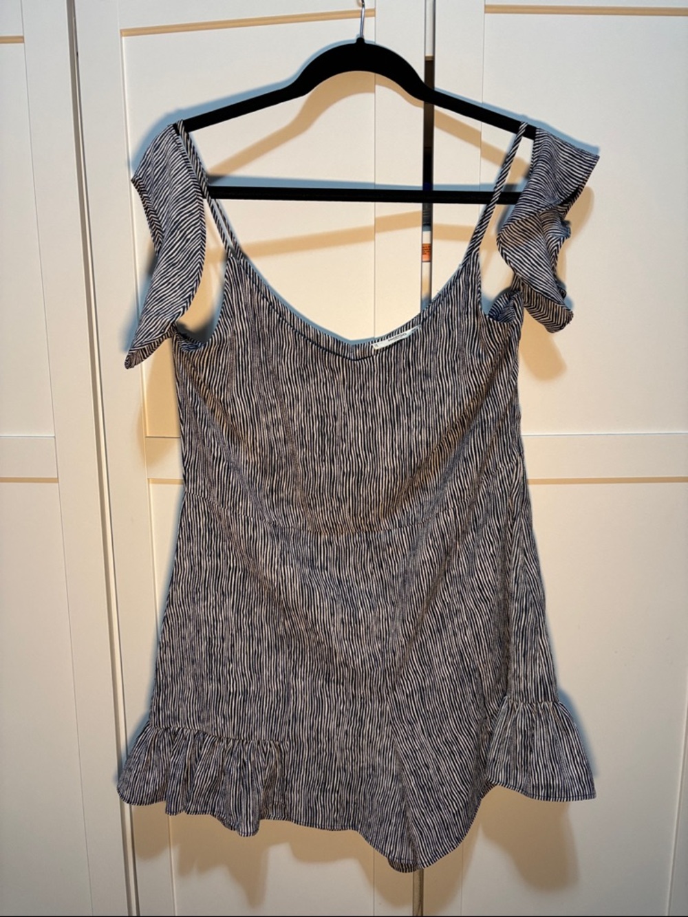 MANGO Women's off the shoulder short romper with ruffles.